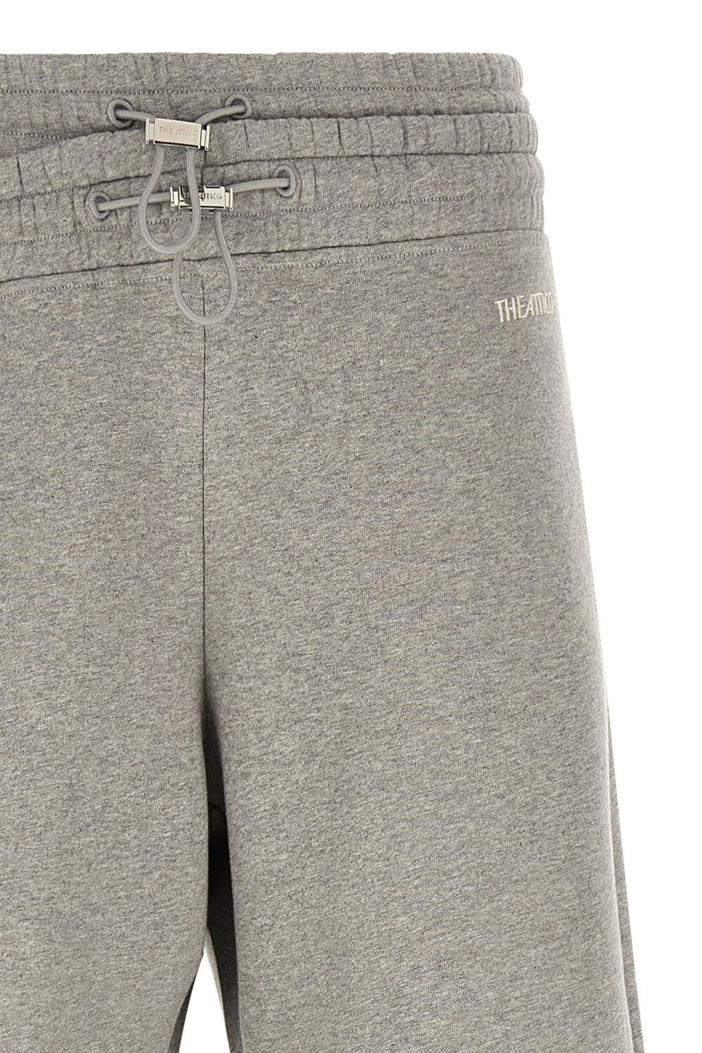 Asymmetrical double waist trousers