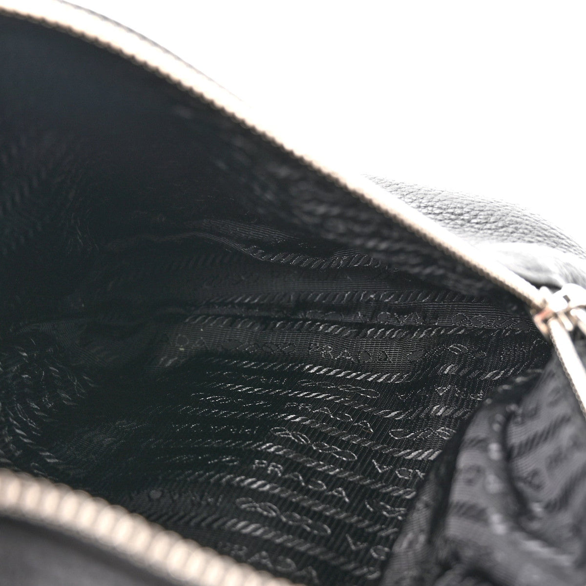 Vitello Daino Logo Embossed Cross Sling Backpack Black