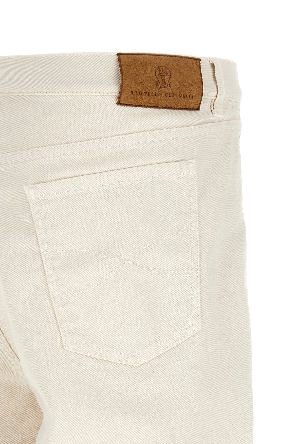 Garment-dyed denim jeans