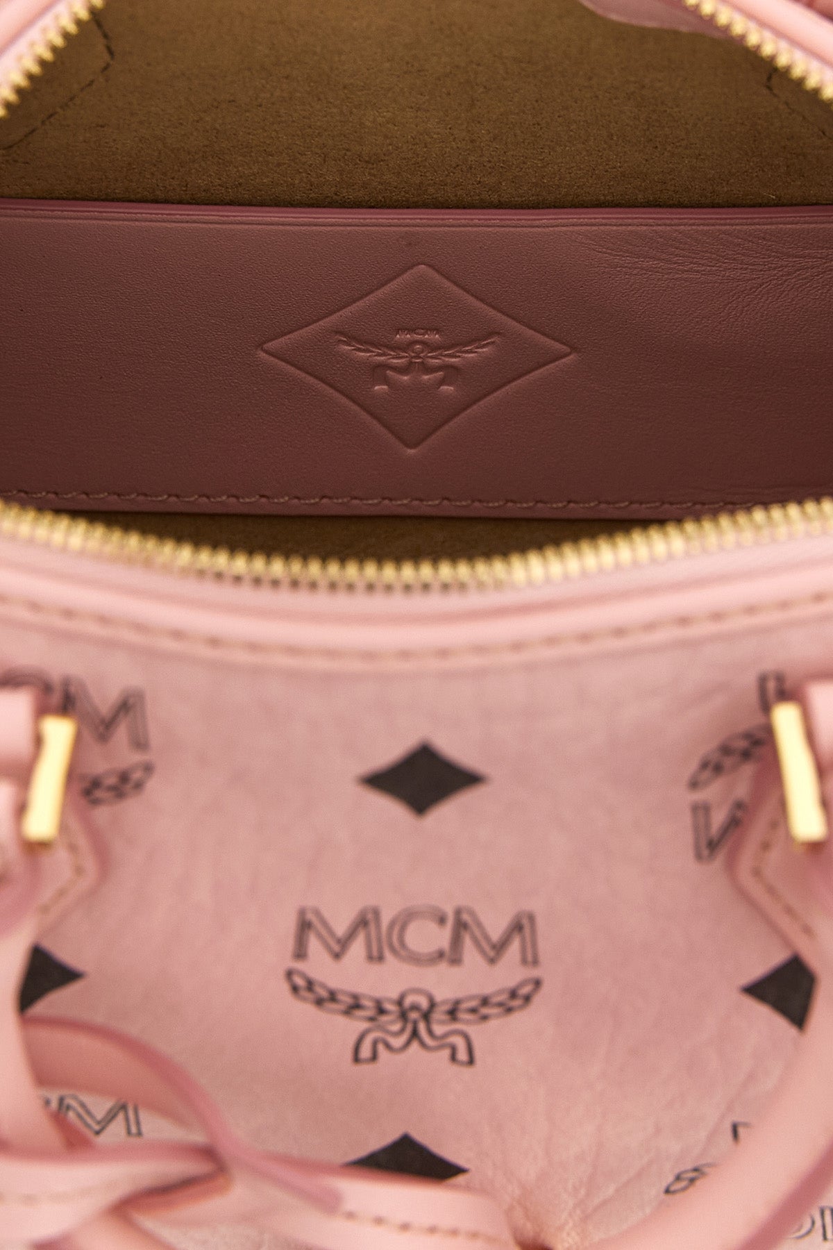 MCM Top handle bag Engraved padlock detail